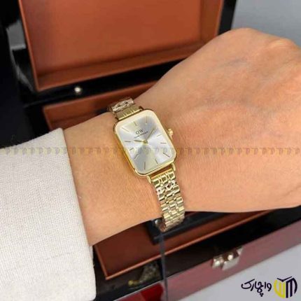 ساعت مچی عقربه ای زنانه برند دنیل ویلینگتون مستطیلی کد 2402 رنگ طلایی صفحه سفید