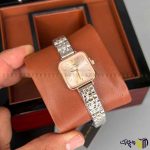ساعت مچی عقربه ای کوارتز زنانه برند دنیل ویلینگتون مربعی طرح 2401 رنگ نقره ای طلایی گلبهی