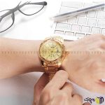ساعت مچی عقربه ای کوارتز مردانه بند استیل برند نیویفورس طرح 9117 رنگ طلایی